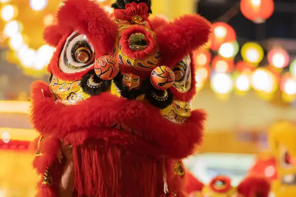 Lion Dance Performance: A thousand years come alive with drums and gongs.