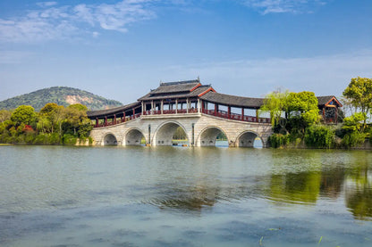 [Premium Jiangnan · Maritime Holiday] 12-Day Tour: Jiangnan Cultural Exploration + Japan-Korea Dual-Country Cruise — Niushou Mountain Buddha Palace · Nianhua Bay Zen Retreat · West Lake Scenic Views · Wuzhen Water Town · Jeju & Fukuoka Cruise Experience